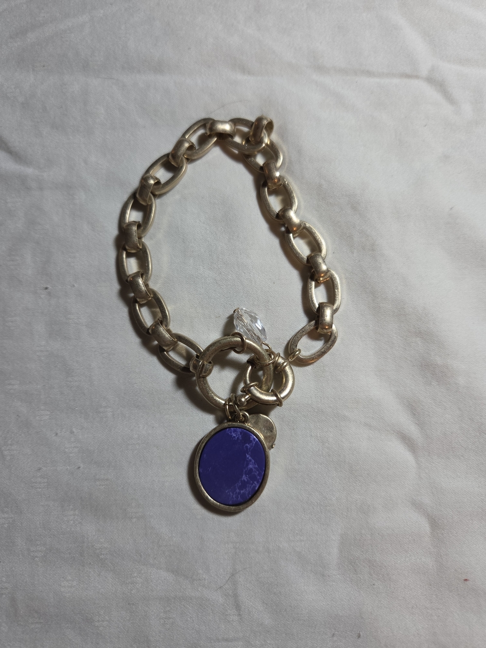 Plunder Gold-Tone Link Bracelet with Blue Oval Charm